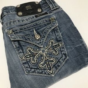 27x32 light blue distressed Miss Me denim boot cut jeans